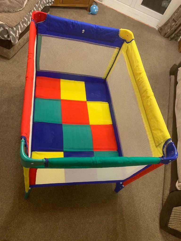graco travel cot colourful